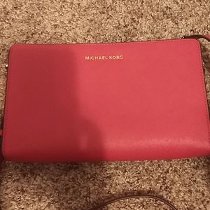 Hot pink Michael Kors crossbody bag